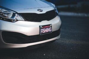 White Kia Rio Car on Road